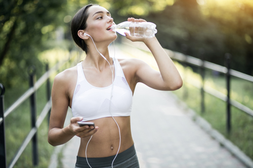 Woman Exercising with Claimed Domestic Health Insurance