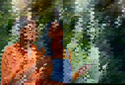 Hand Holding Globe for Working Graduate Jobs Abroad